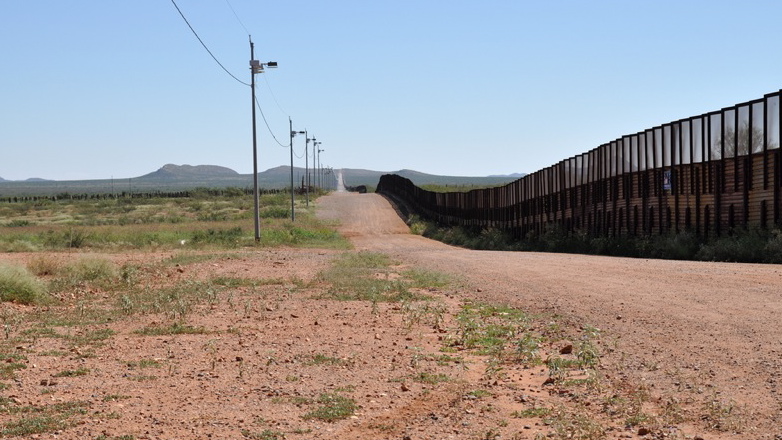 Fence along the U.S.-Mexico border in Necos, Arizona.