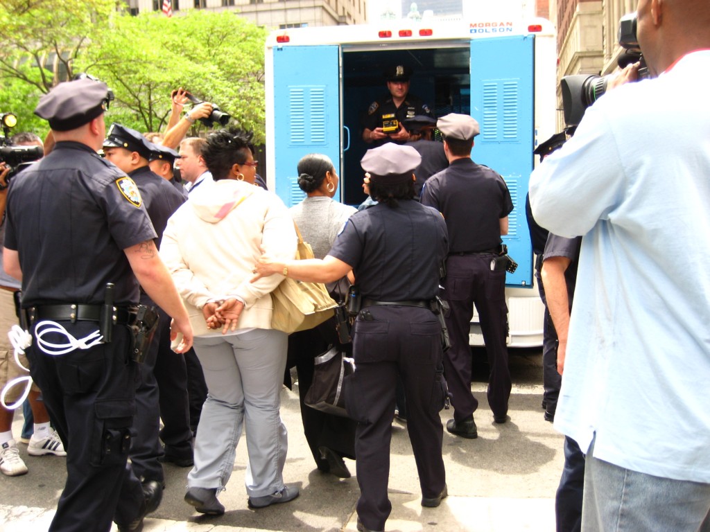 Immigration Activists Arrested at a Protest in New York City. Photo by Norman Eng