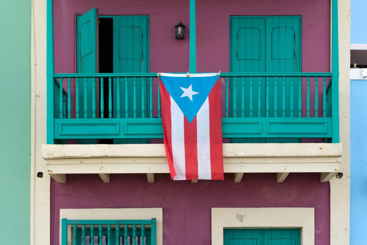 A Puerto Rican flag on a balcony in Old San Juan, Puerto Rico, in 2018. Photo courtesy of Lorie Shaull via Flickr.